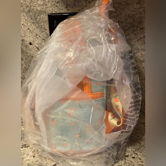 Disney Parks Orange Bird Loungefly Mini Backpack Flower & Garden Epcot NWT - Picture 7 of 7